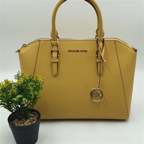 bolso michael kors amarillo|Bolsos de hombro y bomboneras .